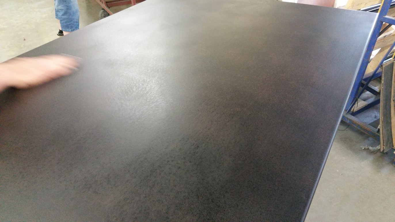 blackened steel patina